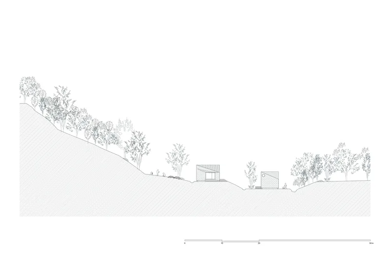 Site section drawing showing two small structures nestled into sloping terrain with scattered trees