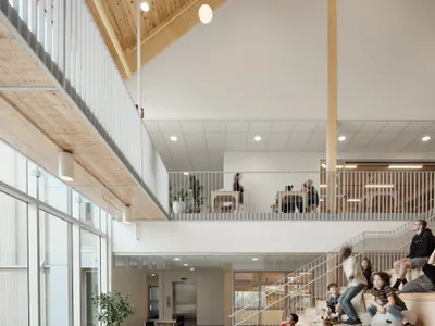 Agence Spatiale Clusters Timber Gables Around a Courtyard to Rethink the Saguenay School