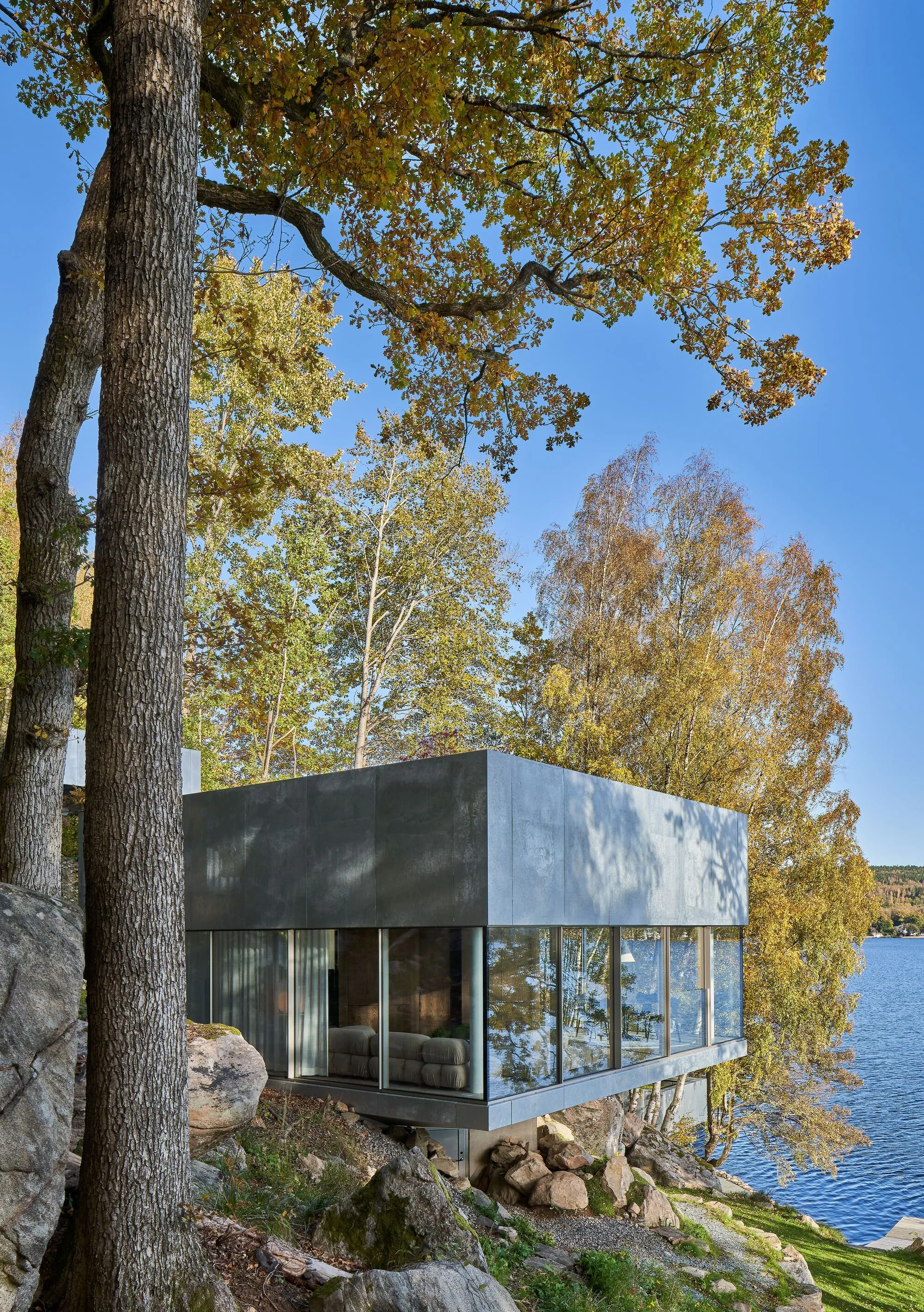 Claesson Koivisto Rune Floats Crystal Pavilions Above a Swedish Lakeside Rock Shelf