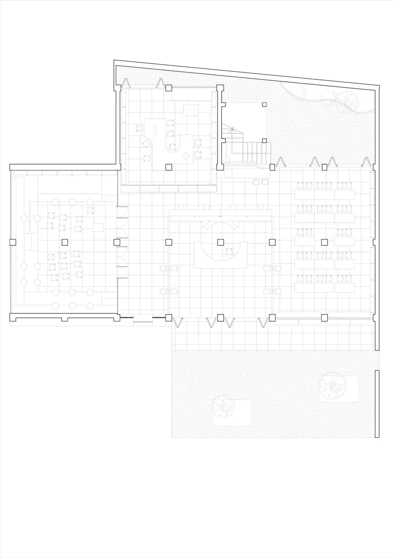Floor plan drawing depicting dining areas, workstations, and outdoor courtyard with tree symbols