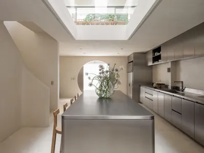 NMDM.ARQ Converts a São Paulo House into a Chef's Hybrid Kitchen and Creative Atelier