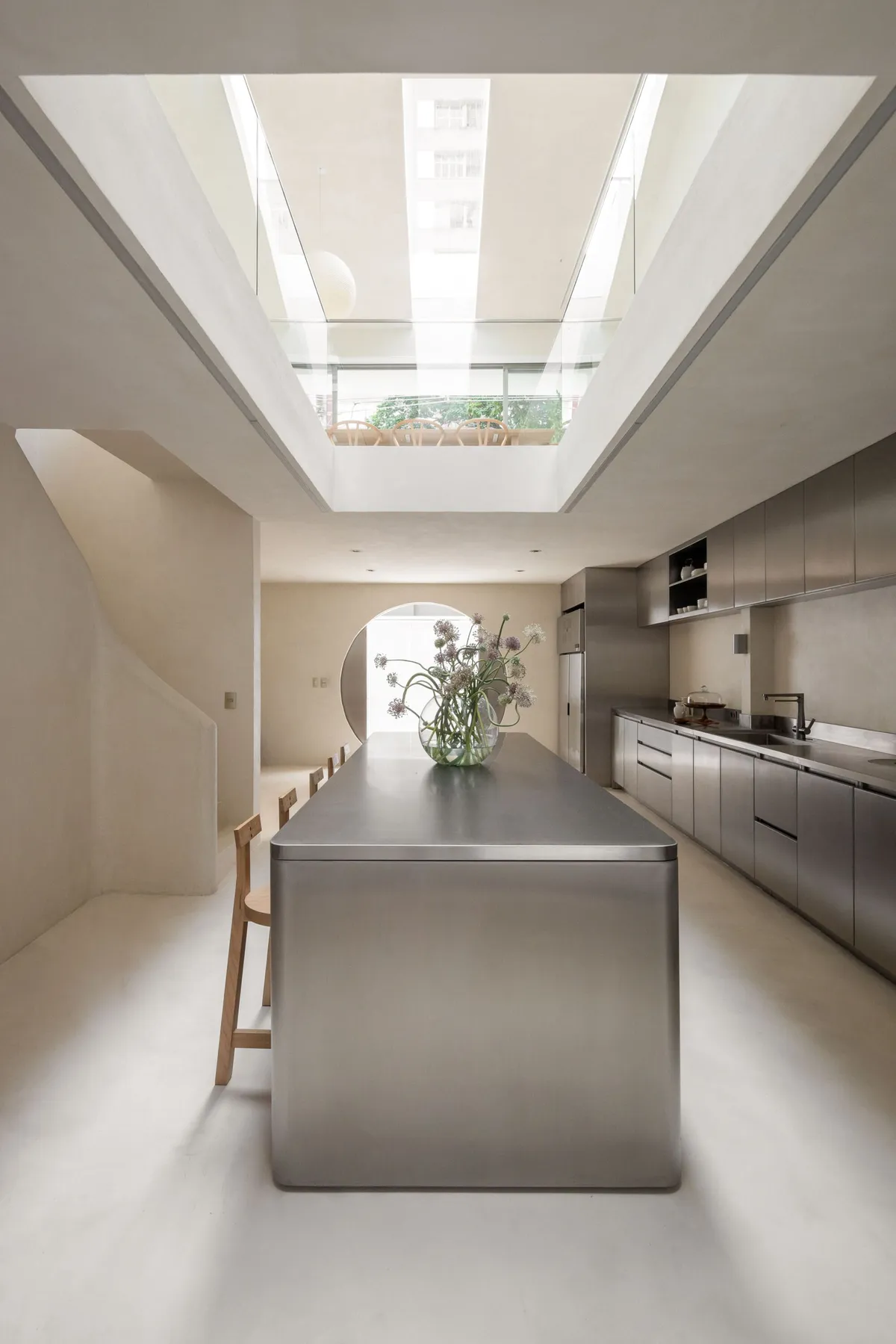 NMDM.ARQ Converts a São Paulo House into a Chef's Hybrid Kitchen and Creative Atelier
