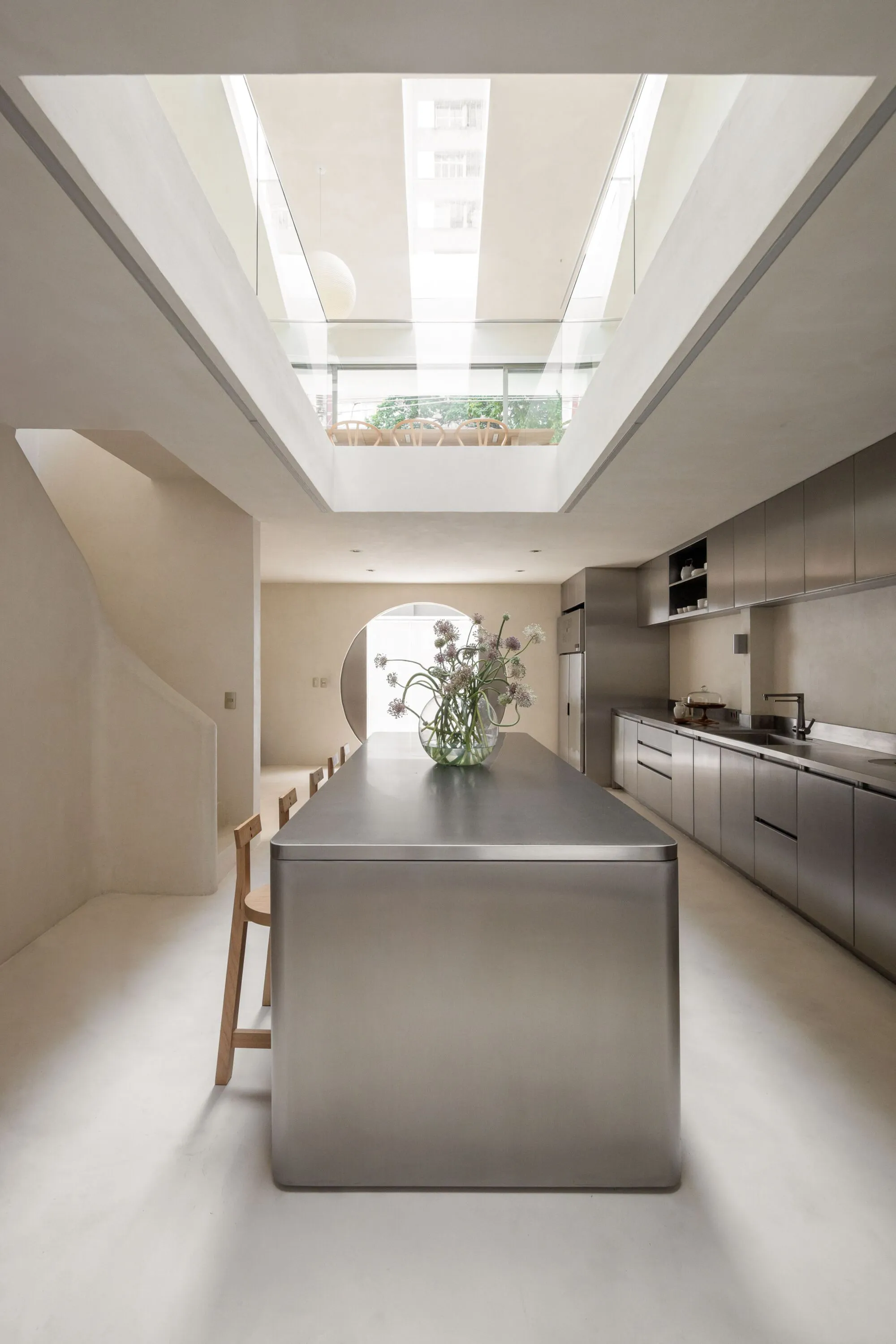 NMDM.ARQ Converts a São Paulo House into a Chef's Hybrid Kitchen and Creative Atelier