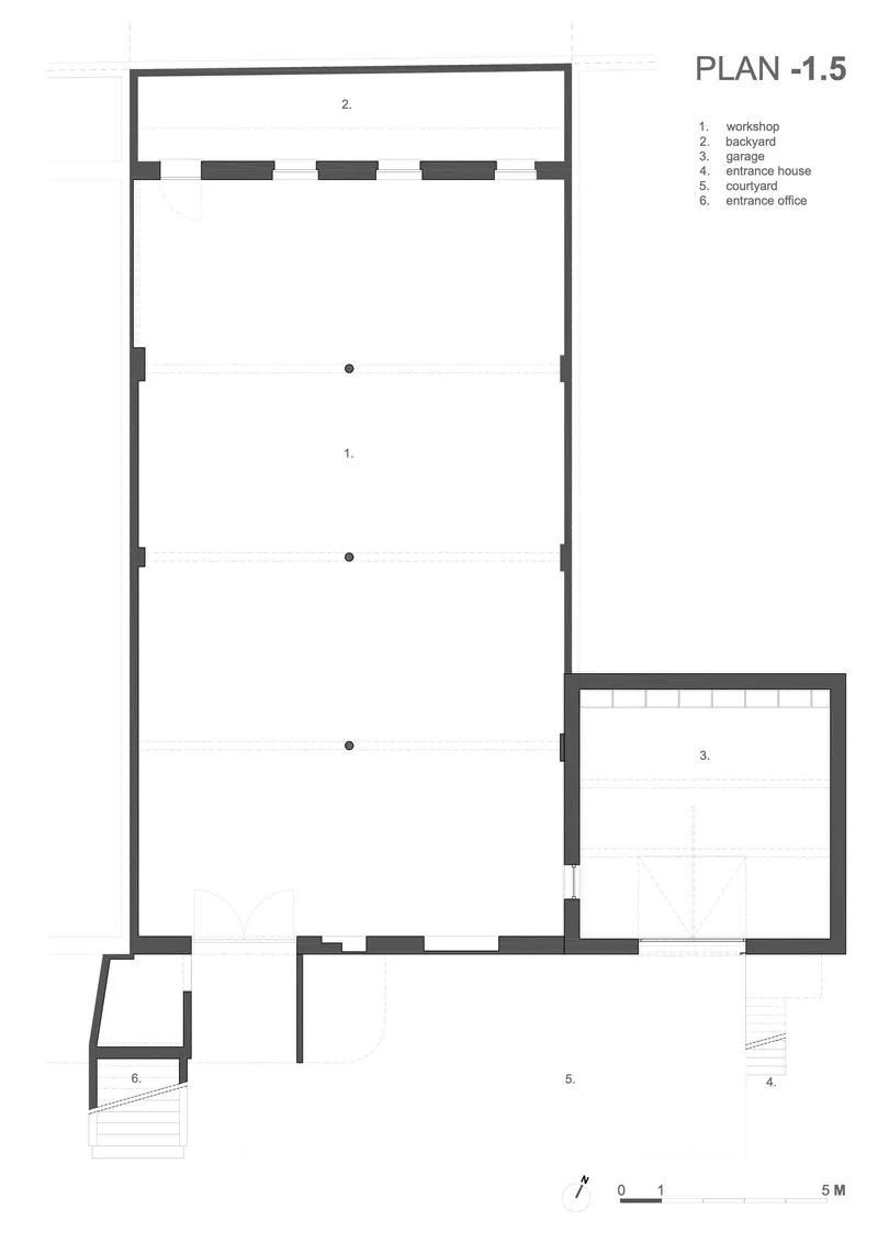 Floor plan drawing showing a long workshop space with attached garage and courtyard at lower level