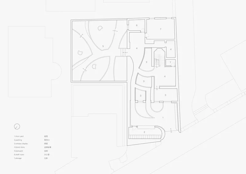 Floor plan drawing showing curvilinear courtyard layout with interior rooms and garden spaces