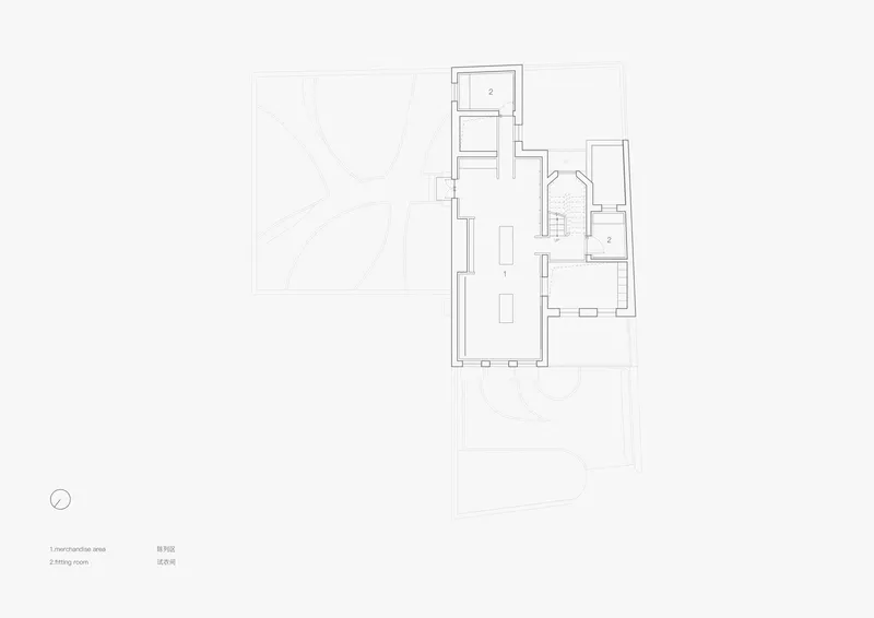 Floor plan drawing showing residential level with elongated main room and adjacent spaces