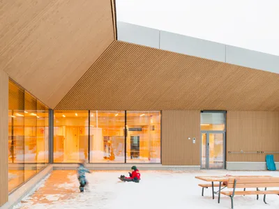 Verstas Architects Folds a Timber Daycare Center into Helsinki's Rocky Terrain