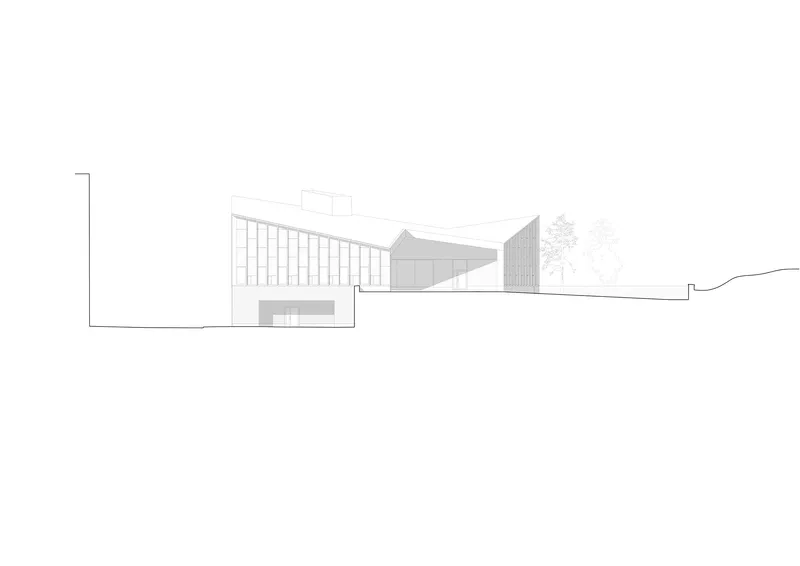 Elevation drawing showing a glazed vertical facade and sloping roof forms with trees in silhouette