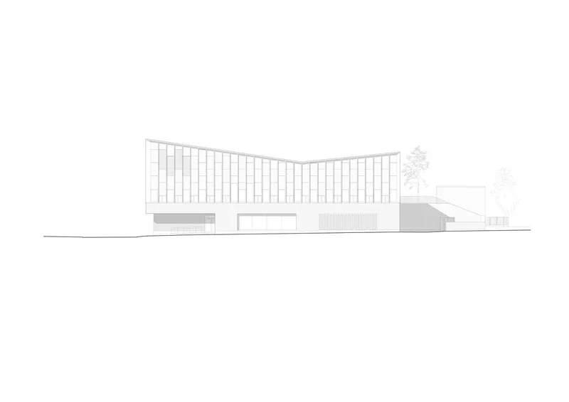 Elevation drawing depicting vertical window bays above a recessed ground floor opening and lower volumes