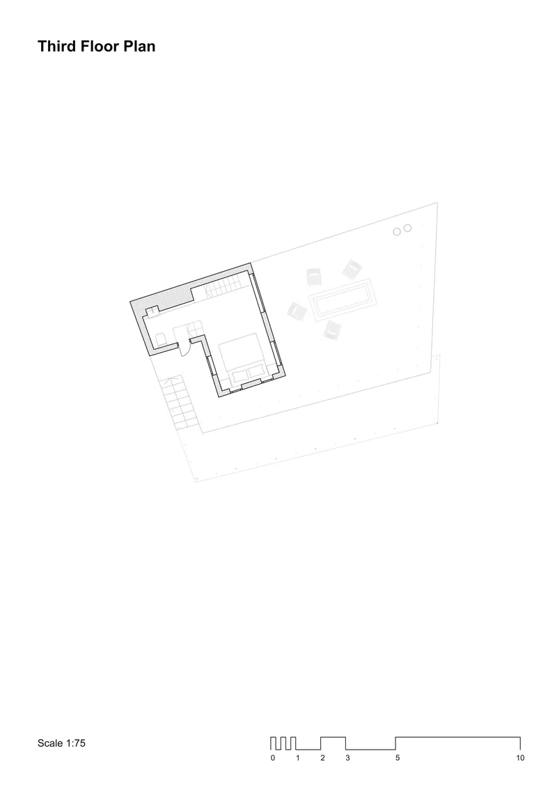 Third floor plan drawing showing a bedroom suite with bathroom and roof terrace