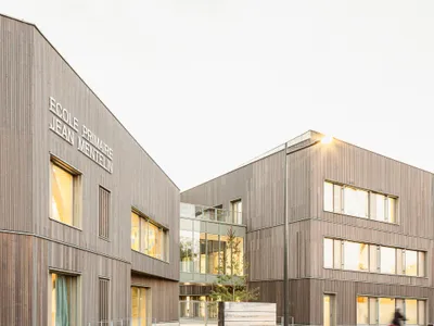 feld72 and Agence MW Fragment a Strasbourg School into Three Timber Volumes Rooted in Nature