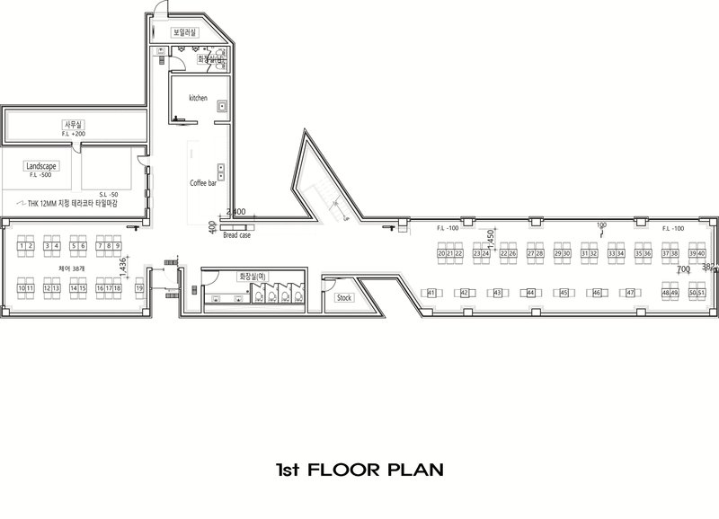 First floor plan drawing showing triangular chapel volume connected to rectangular cafe and kitchen spaces