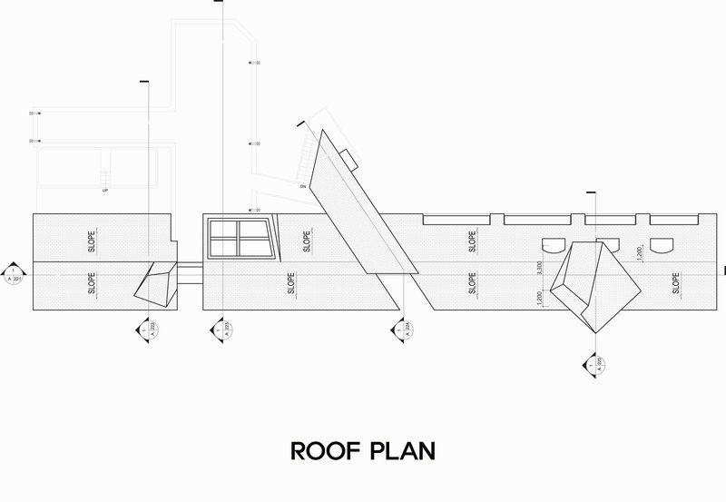 Roof plan drawing illustrating angular projecting forms above a rectilinear base with slope annotations