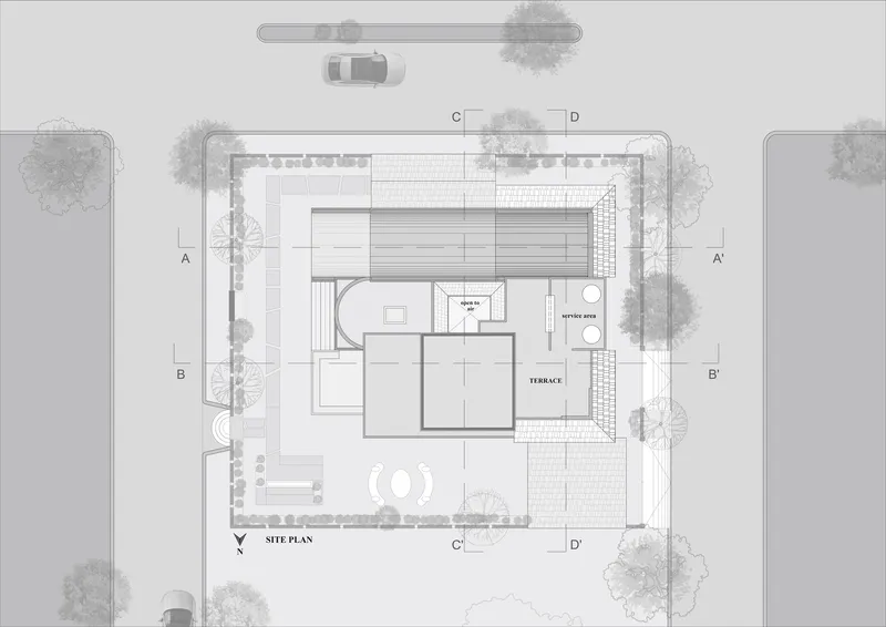 Site plan drawing showing the residential building footprint surrounded by trees and adjacent roads