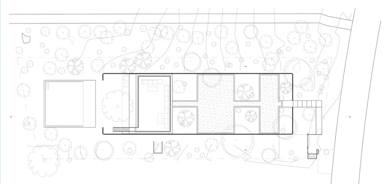 Site plan drawing showing linear volumes surrounded by landscaped grounds with scattered tree symbols