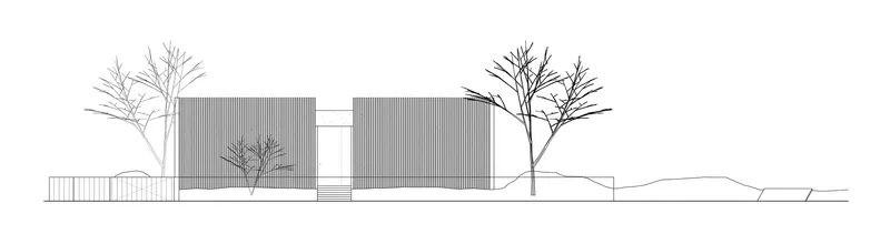 Elevation drawing featuring two corrugated metal volumes separated by a glazed connector and bare trees