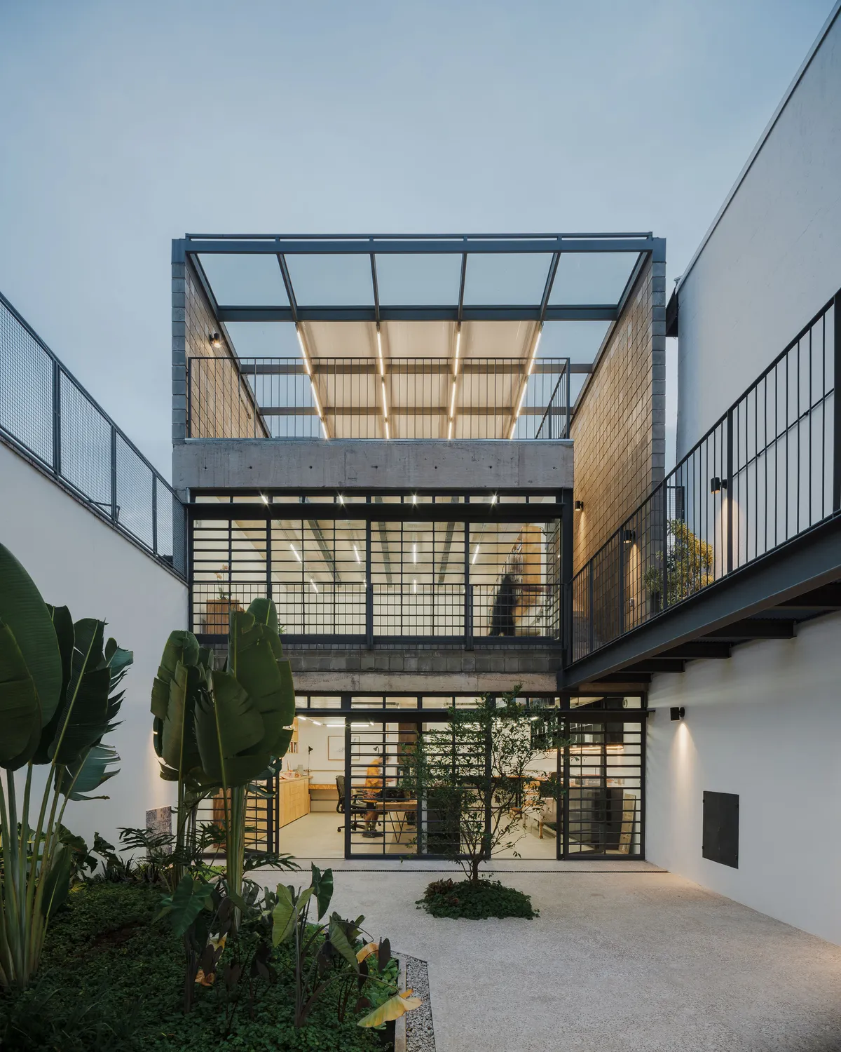 23 SUL Builds an Artist Couple a Three-Story Studio Around a Tropical Courtyard in São Paulo