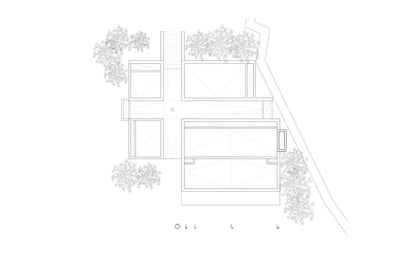 Elevation drawing showing the stacked volumes and central stair tower with tree canopies