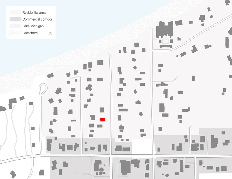 Site plan showing the residence highlighted in red among residential blocks near the lakeshore