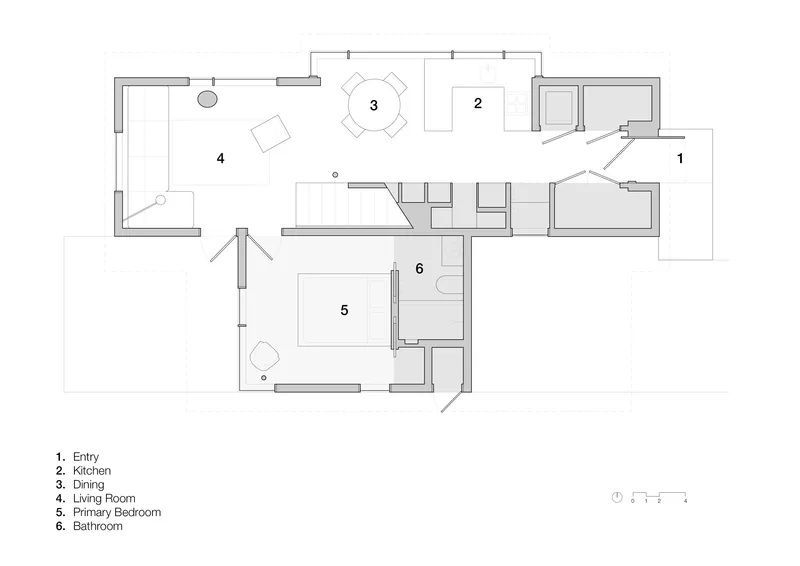 Ground floor plan drawing showing entry, kitchen, dining, living room, primary bedroom and bathroom