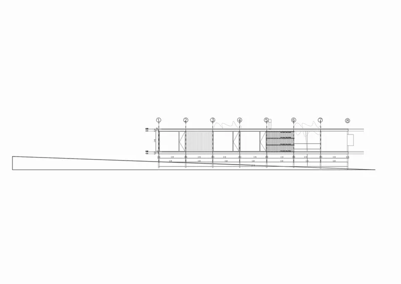 Elevation drawing showing the raised structure on sloped terrain with steel columns and timber cladding