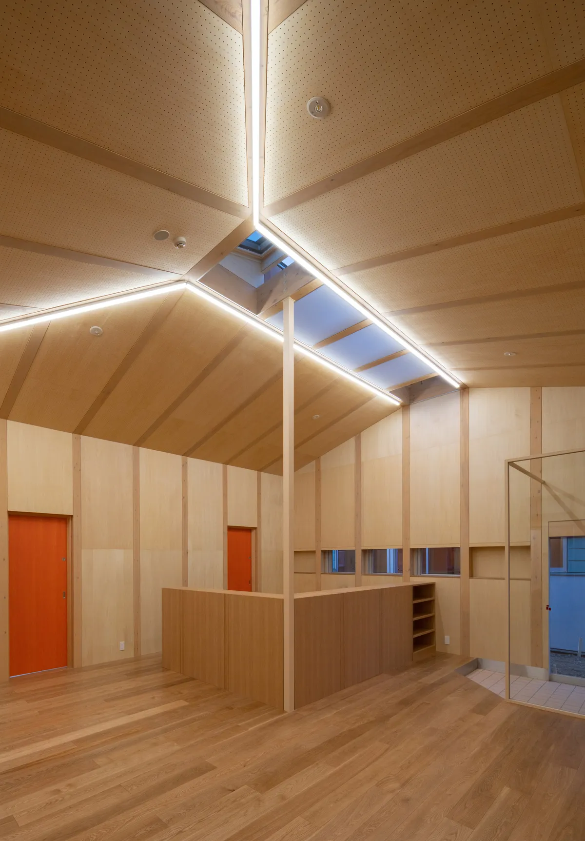 D.A Scatters a Village of Gabled Rooms Across a Family Support Center in Kofu