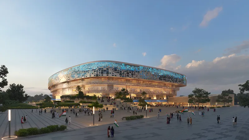 Circular arena with layered facade of perforated bronze panels and illuminated glazing at dusk with crowd arriving