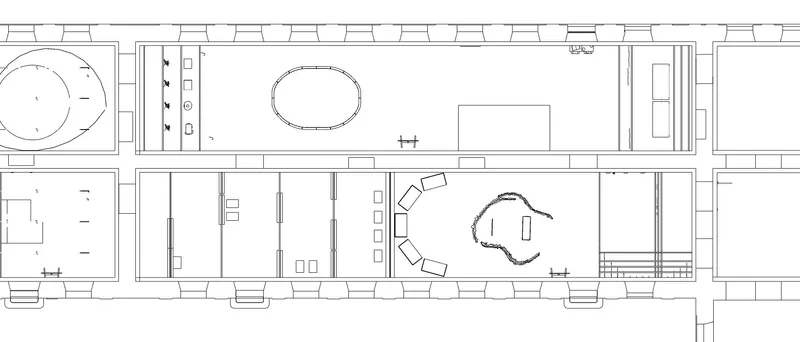 Floor plan drawing showing linear gallery spaces with curved seating area and circular element