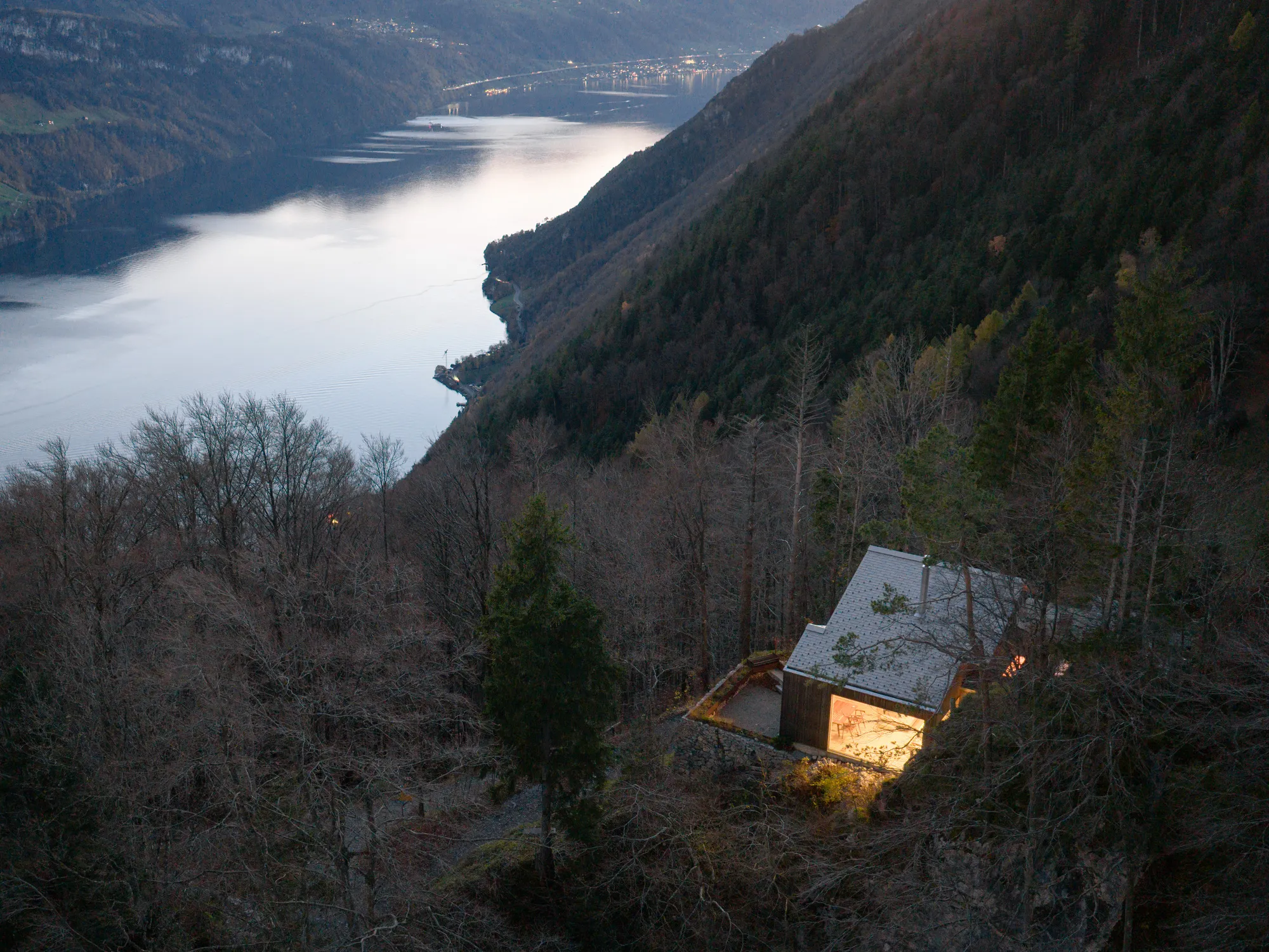 Guča arch Helicopters a CLT Cabin onto a Swiss Cliff above Lake Uri