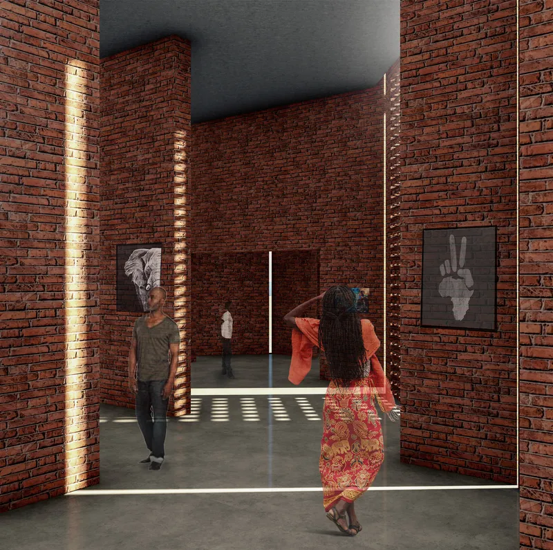 Brick-lined corridor with filtered light guiding visitors into a contemplative interior space.