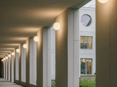 FELT Architecture and Oskar Architecten Frame a Chapel with an L-Shaped Arts Campus in Asse