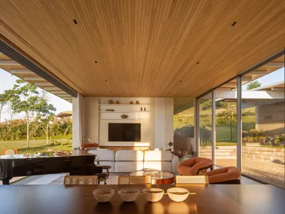 Kiko Castello Branco and Lucas Cunha Split a Brazilian Home into Two Timber Pavilions on a Sloping Corner Lot