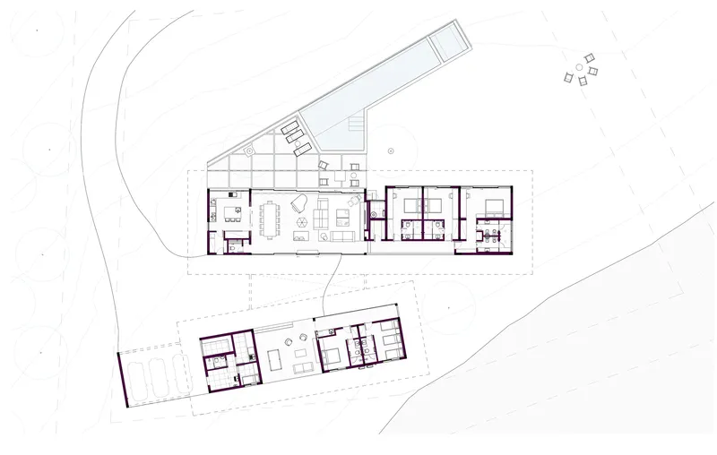 Floor plan drawing showing two angled linear volumes connected by circulation and outdoor spaces