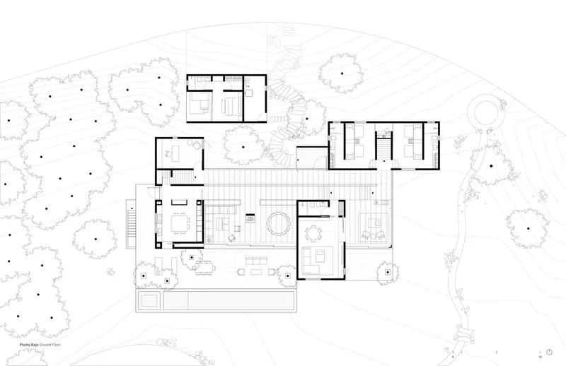 Ground floor plan drawing showing open living areas and bedroom wings extending through the landscape