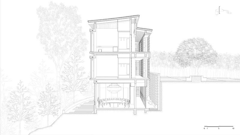 Section drawing of a three-story residence with varied roof pitches nestled among deciduous and coniferous trees