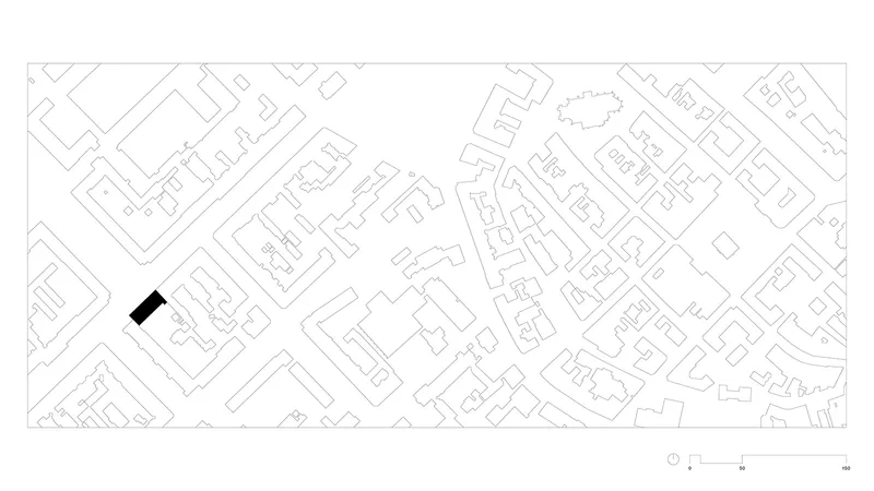 Site plan drawing showing single building footprint highlighted in black within surrounding urban fabric