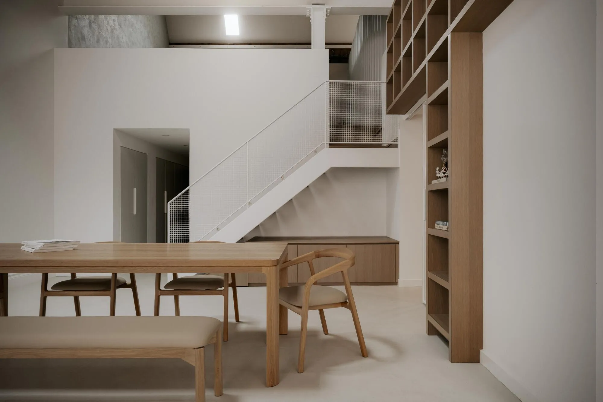 StudioAC Carves a Dollhouse World of Curves and Timber Inside a Toronto Loft