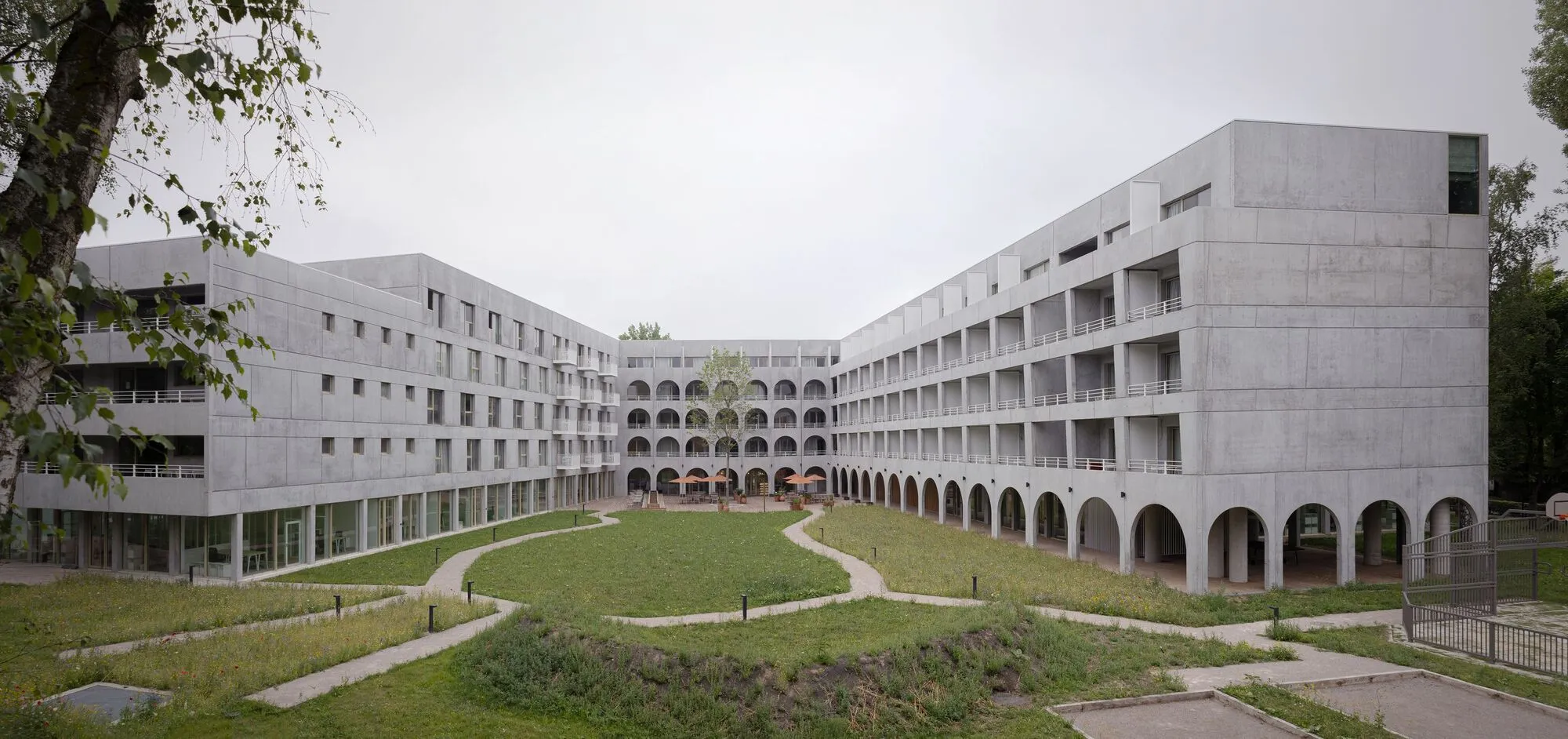 D'Houndt+Bajart and Associés Build a 228-Room Coliving Village Around a Wildflower Courtyard Near Lille