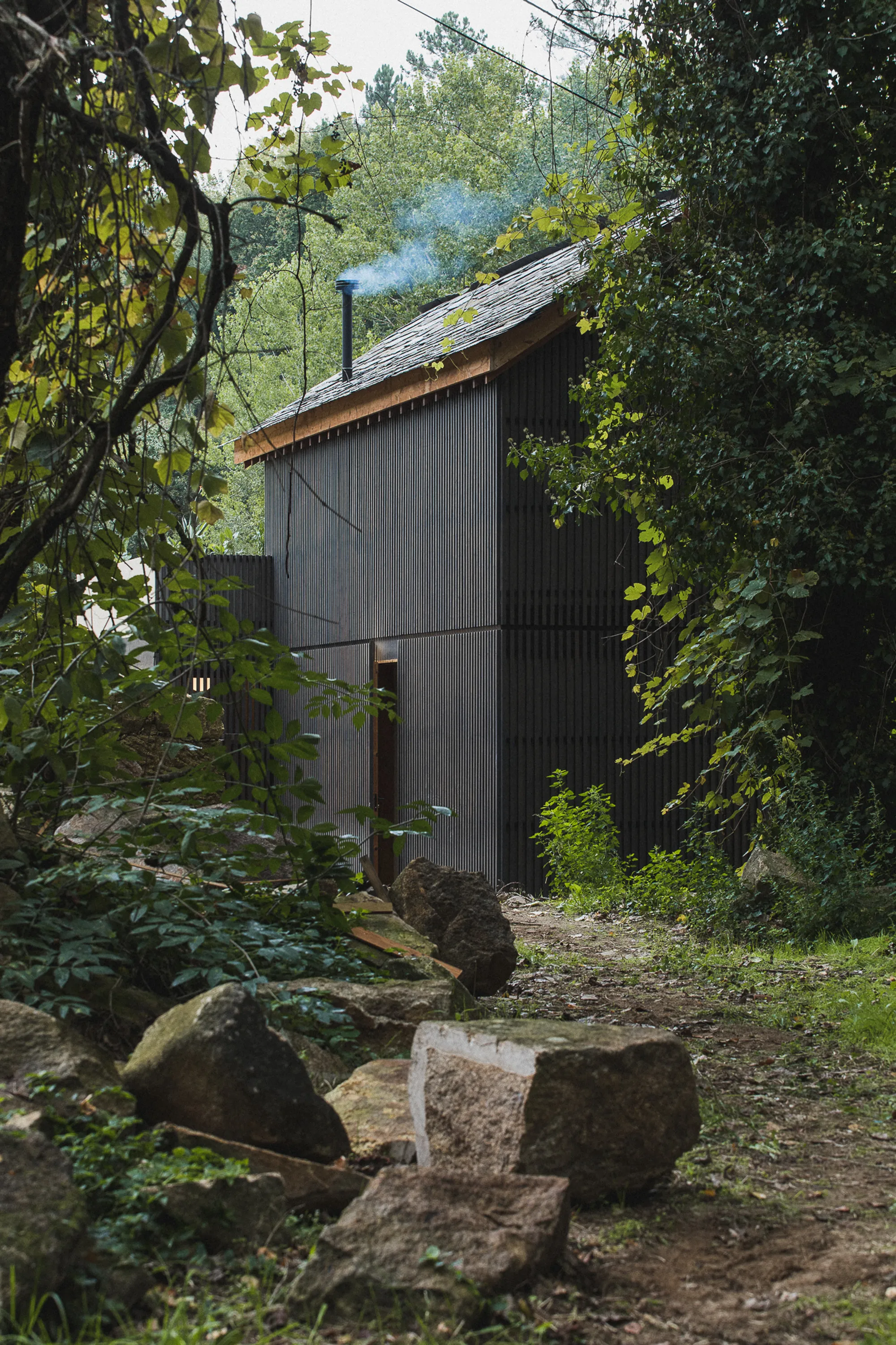 Marta Brandão and Mimahousing Rebuild a Crumbling Granary as a Timber Retreat in Arouca