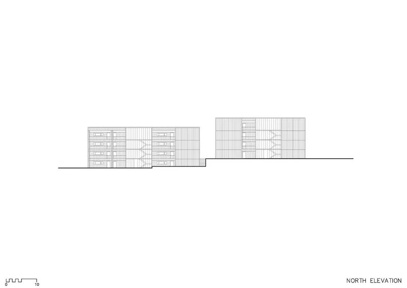 North elevation drawing showing three connected residential blocks stepping down across the sloping site