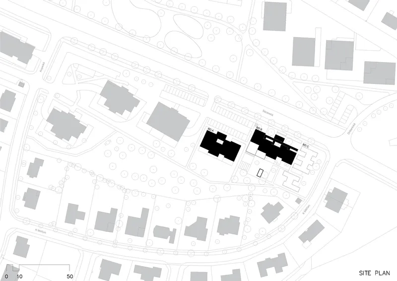 Site plan drawing showing two residential blocks positioned within a curved suburban street layout
