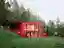 Architektura Sinks a Red Steel Villa into a Bohemian Forest Slope