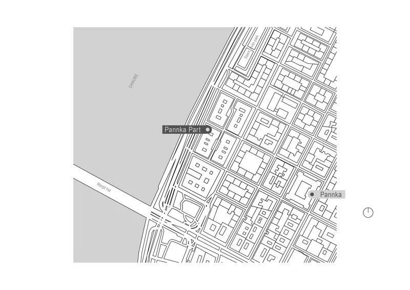 Site plan drawing showing a triangular footprint within an urban block adjacent to railway lines