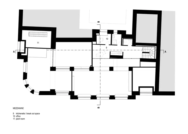 Mezzanine level floor plan drawing revealing a central void and office spaces