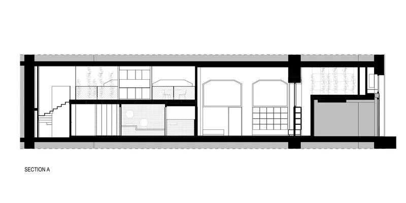 Section drawing showing stair connections and tall window openings across two floors