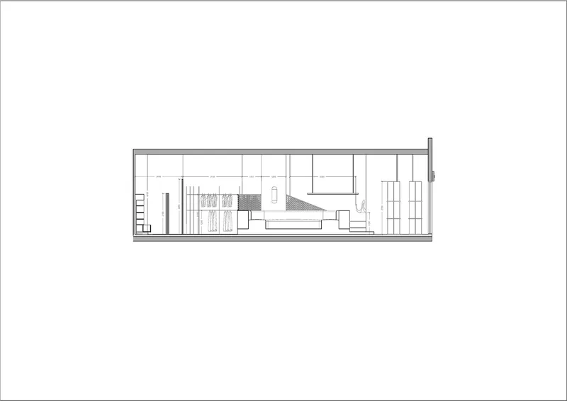 Longitudinal section drawing revealing sloped floor levels and vertical circulation elements within the narrow volume