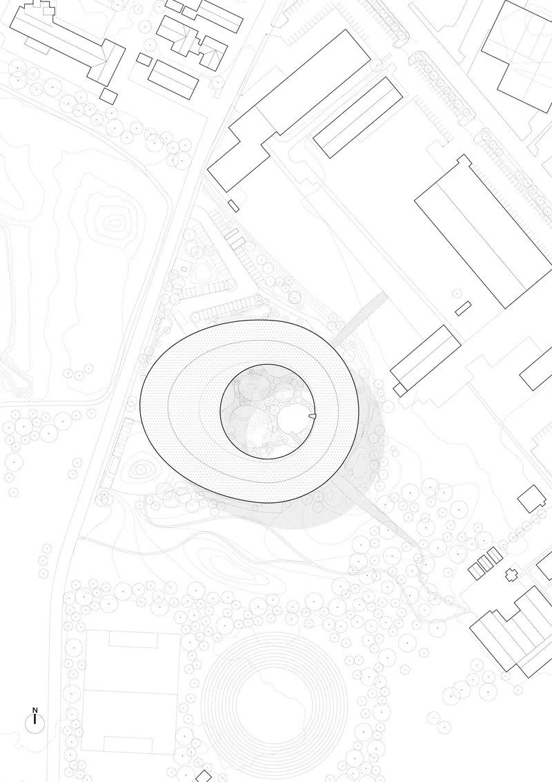 Site plan drawing showing the circular building footprint surrounded by landscaping and adjacent structures