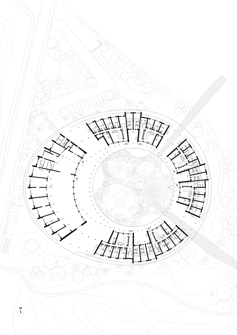 Floor plan drawing showing ring-shaped layout with central courtyard and radiating residential units