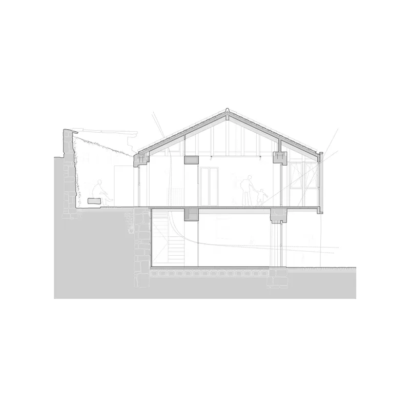 Section drawing showing a two-story residence with pitched roof and basement level