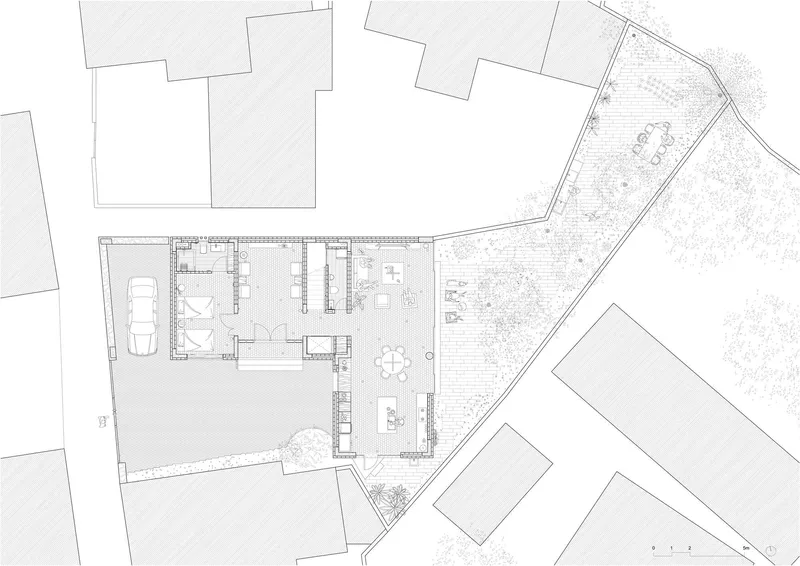 Site plan drawing showing ground floor layout with courtyard garden and surrounding structures